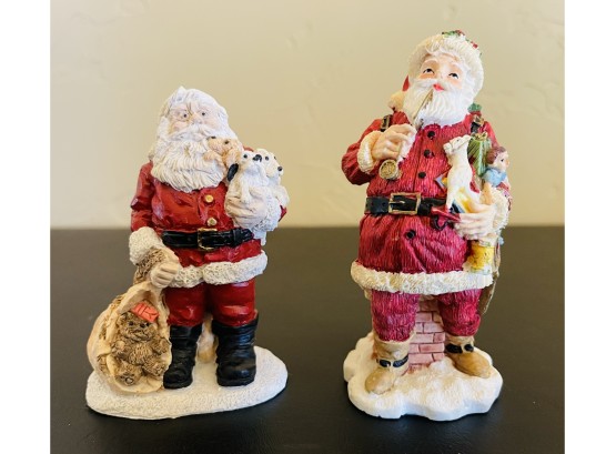 2 Resin Santas Figurines