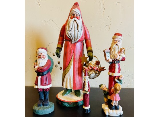 Four Piece Carved Look Santa Lot