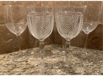 An Assortment Of Six Long Stemmed Wine Glasses