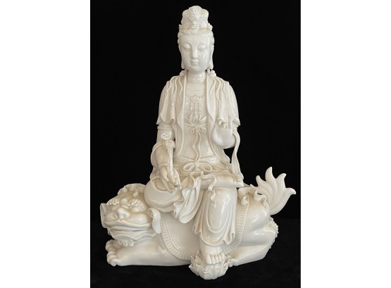 Lovely Ivory Tone Porcelain Deity Seated On Foo Dog