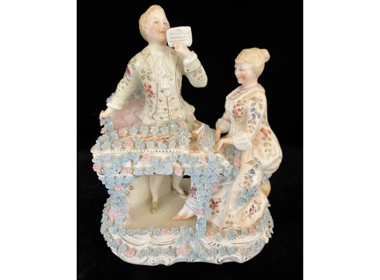 German Porcelain Figurine Of Couple At Piano With Intricate Flower Accents In Blue