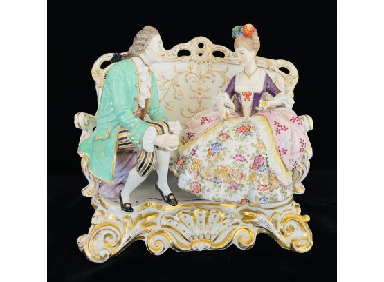 German Porcelain Figurine Of 18th Century Couple Seated On Sofa