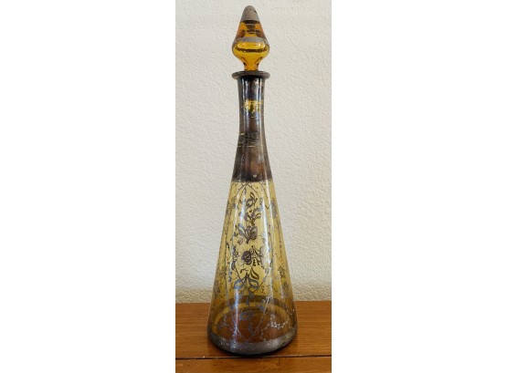 Vintage Amber Glass Bottle W/ Worn Metallic Design