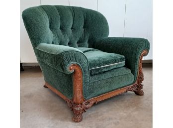 Antique Upholstered Green Chair With Carved Wood Legs And Tufted Back