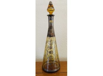 Vintage Amber Glass Bottle W/ Worn Metallic Design