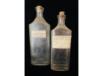 2 Antique Glass Medicine Bottles