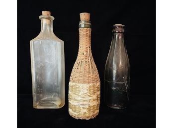 3 Antique Bottles With Corks