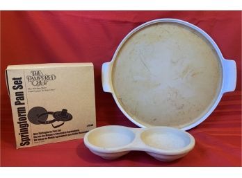 A Group Of Pampered Chef Items In A 15' Round Stone, Spring Form Pan Set And More