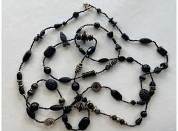 Extra Long Black And Gold Necklace With Art Glass Beads And Carved Onyx Pieces