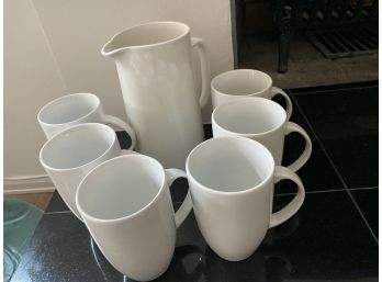 Collection Of Cream Tall Coffee Mugs With Porcelain Pitcher
