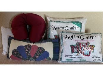 Small Assortment Of Small Pillows Including A Battery Operated Neck Pillow