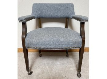 Grey Upholstered Chair On Wheels