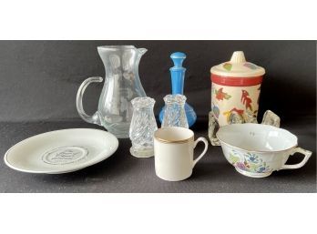 A Misc. Assortment Of Dishes Inc Salt And Pepper, Small Etched Glass Pitcher, VTG Avon Cologne Decanter & More