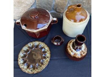Set Of 5 Brown Glazed Pottery Pieces With Jug Including Deviled Egg Dish, Bean Pot, And More