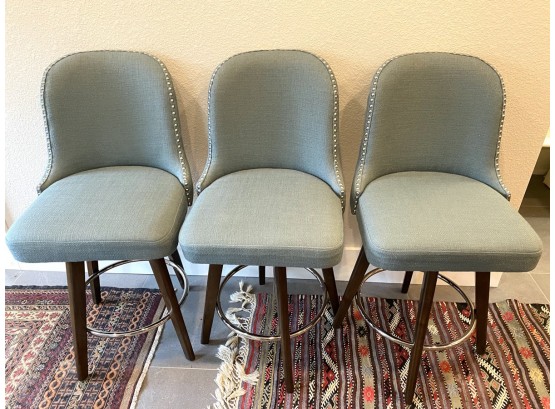 Collection Of Three Madison Park Soft Turquoise Upholstered Bar Stools With Stud Details