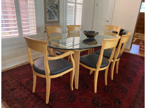 Italian Modern Oval Dining Room Table With Six Blonde Wood Chairs