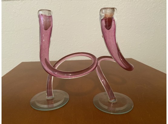 Two Sculptural Glass Candlesticks Featuring Pink And Green Glass