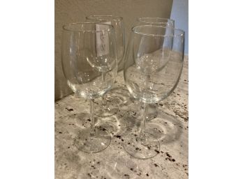 Four Elegant Stemmed Wine Glasses