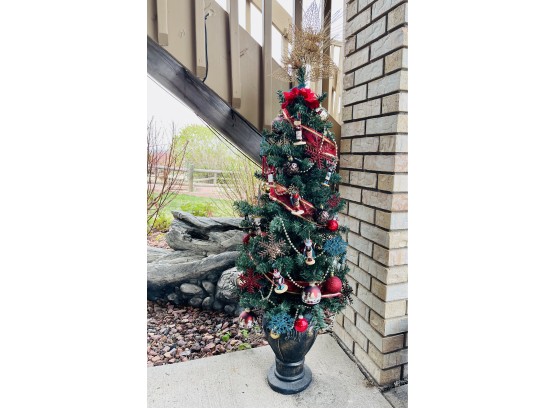 Decorated Christmas Tree In Urn