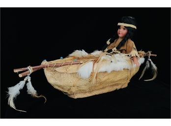 Hand Made Porcelain Native American Doll In Canoe