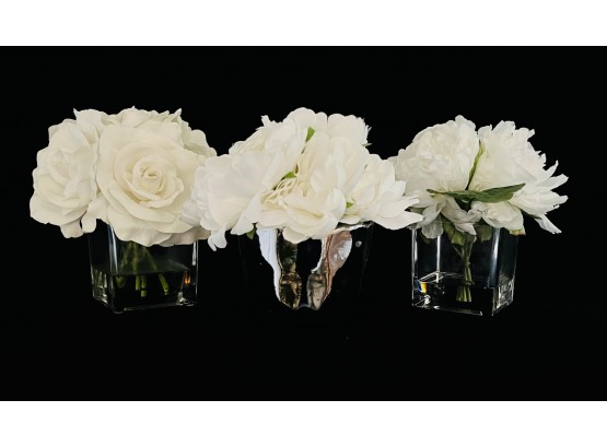 3 White Floral Arrangements With 2 In Clear Glass Vases & 1 In Metallic Ceramic Vase 8'