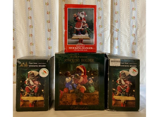 4 Various Sized Hand Painted Stocking Holders In Original Boxes