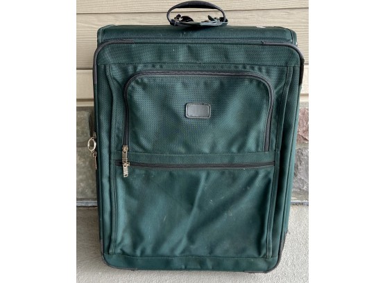 Green Tumi Suitcase On Wheels