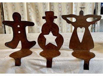 3 Metal Stocking Holders Including Angel, Snowman, And Gingerbread Man