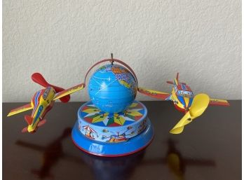 German Spinning Tin Toy With Globe And Airplanes