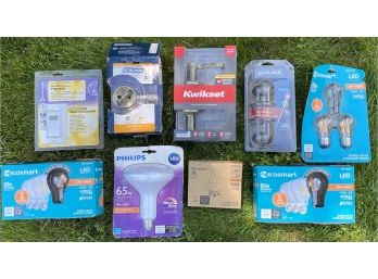 Assortment Of Home Accessories Including Light Bulbs, Door Knobs And More