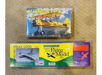 New In Box Pair Of Model Airplanes One Is A Stearman PT-17 And The Other A Hughes Hk-1 Spruce Goode