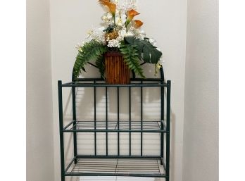 Painted Green Hanging Shelf With Artificial Flower Arrangement
