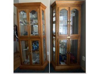 Pair Of 2 Lighted Oak Curio Cabinets With Brass Handles