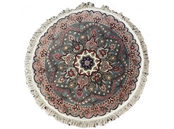 Small Round Wool Rug With Scalloped Edge Used As Table Topper