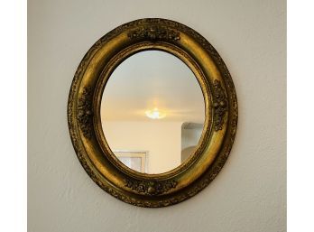 Antique Oval Gilt Mirror With Floral Foliate Detailing