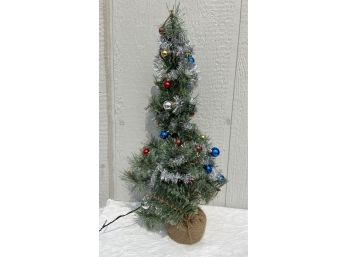 Small Christmas Tree With Battery Powered Lights And Ornaments