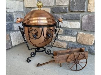 Copper Pot With Brass Handle And A Cast Iron Base, And A Miniature Wood Cart