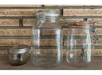 Pair Of Airtight Glass Containers And A Lidded Jar