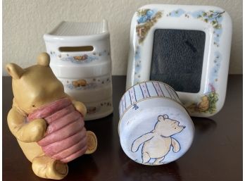 Four Pieces Of Winnie The Pooh Collectibles Including Royal Doulton Book Bank