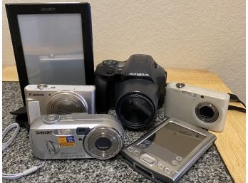 Group Of Cameras & Electronics Including Olympus, Canon & Sony