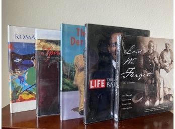 Collection Of Books  Including Lest We Forget, The Music In Derrick’s Heart, & Romare Bearden