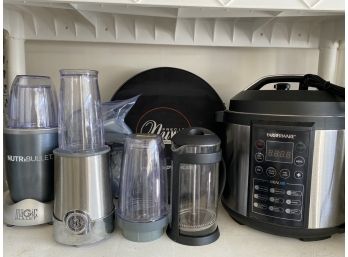 Grouping Of Kitchenware Including Nutra Bullet & Faberware Pressure Cooker