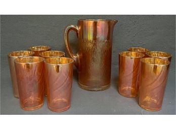 Carnival Glass Pitcher With 9 Glasses
