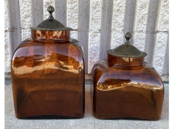 Pair Of Amber Colored Glass Lidded Jars