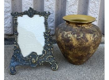 Decorative Jar With An Ornate Picture Frame