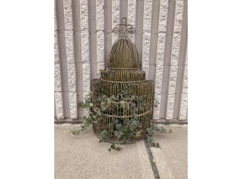 Halved Birdcage Filled With Faux Foliage