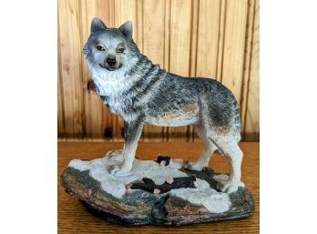 Lone Wolf On Snowy Rock Sculpture