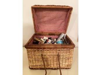 Picnic Basket Filled With Threads And Sewing Accessories