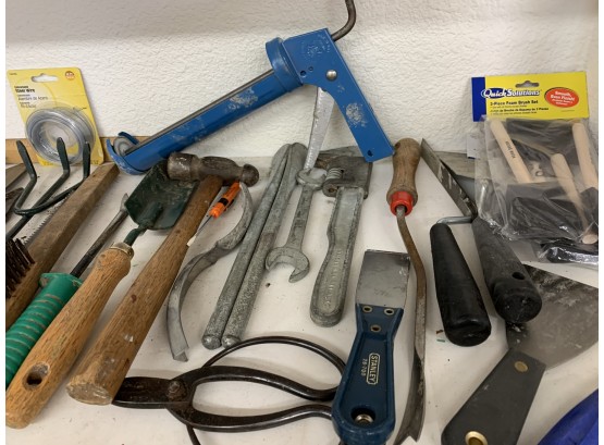 Lot Of Garage Finds Including Bungee Cords, Hand Tools, And Caulking Gun