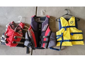 Three Life Jackets With Various Sizes
